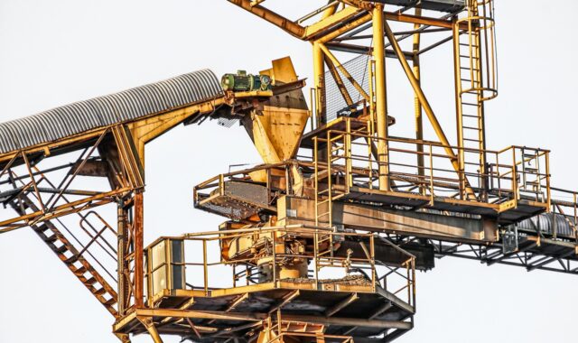 financial support, excavator, technology, industry, metal, stole, iron, construction, crane, conveyor technology, steel construction, ladder, solid, stable, yellow, mining, raw material, stone, lava sand, industrial plant
