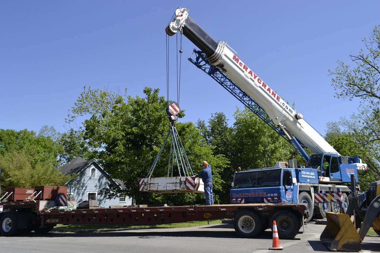 crane, machine, tractor, transportation system, vehicle, equipment, road, industry, action, heavy, street, soil, outdoors, wheel, car, shovel, pavement, bulldozer, traffic, truck, technology, business, sky, power, container, energy, industrial, blue, metal, large, pipeline, construction, environment, production, building, big, mcray crane, houston texas, damage, storm, clean-up, work, lift, worker, hoisted, travel, modern, line, safety, system, auto, electronic, storm damage, demolition, excavation, excavate, lower, lowered, onto, flatbed, jeans, control, hook, steel, concrete, slab, iron, might, strong, strength, hard, tough, powerful, tool, exterior, outside, tree, suburb, home, house, green, white, blue truck, blue tools, blue safety, blue clean, onto, flatbed, flatbed, flatbed, flatbed, flatbed